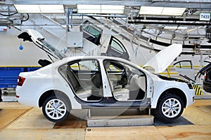 Skoda Octavia on conveyor line in factory