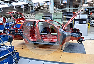 Skoda Octavia on conveyor line in factory