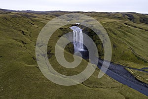 Skogafoss aerial view with the plain above visible photo