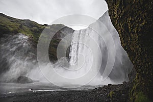 Skogafoss Iceland famous waterfall. Powerful stream, dramatic view with nobody