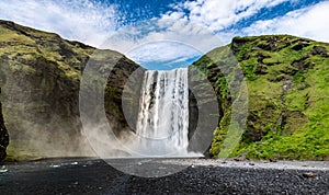 Skogafoss waterfall in Iceland during a summer day