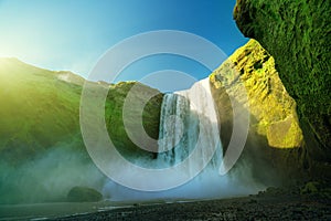 Skogarfoss waterfall and summer sunny day