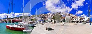 Skopekos island- popular tourist summer destination in Greece. Old port photo