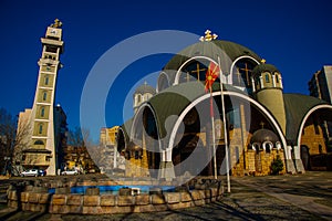 SKOPJE, NORTH MACEDONIA: Beautiful Orthodox Saint Clement of Ohrid Church against the blue sky in the center.