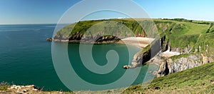 Skrinkle sandy beach and cliffs in Pembrokeshire photo