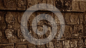 Skull carving on a wall in the Yucatan jungle