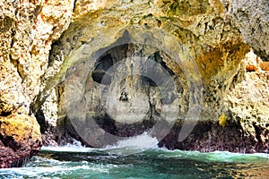 Skull cave on crags of Lagos in Algarve, Portugal