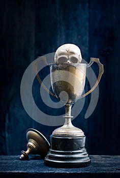 Skull emerge from trophy trophy