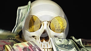 Skull with US Dollar bills in his mouth. bitcoins on the eyes.