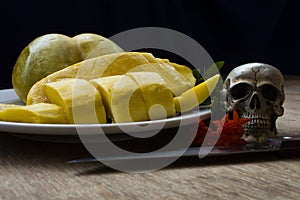 Skulls with fruit and flower rot