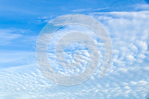 Sky with altocumulus floccus clouds