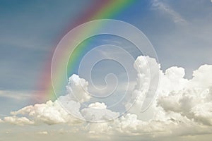 Sky background with cloudy scene (Summer day sky) and rainbow