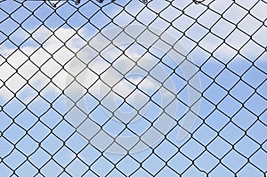 Sky behind the fence. The concept of freedom security loneliness imprisonmentrefugee