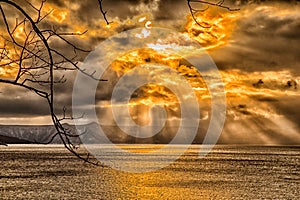 Sky breakthrough over the sea photo