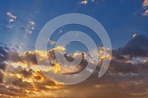 Sky with cloud and sun ray yellow and blue color background. With copy space for text or design