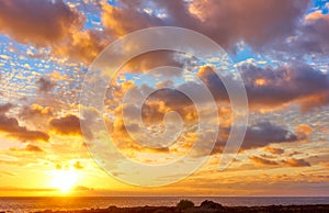 Sky with clouds above the Atlantic Ocean at sunset