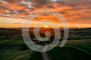 Sky clouds air drone view, yellow orange color landscape