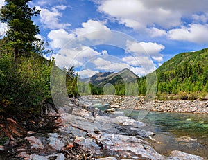 Sky with clouds over the mountain river