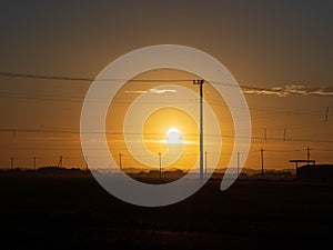 Sky and clouds at sunset, abstract colorful background, orange and blue.