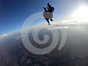 Sky dive tandem friends at the sunset