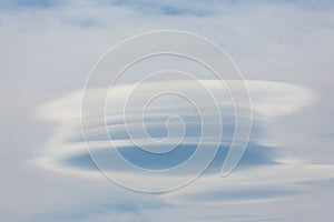 Sky filled with lenticular clouds