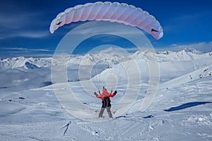 Sky gliding in snowy Caucasus mountains