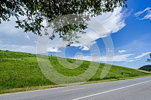 Sky with green fields