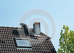 Sky-High Roofers: Destroying repairing a Chimney.