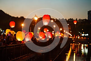 Sky Lantern Festival. Flying lantern in the dark sky at night