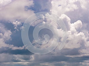 Sky with layers of clouds. Blue sky and puffy clouds background. Cloudscape view full of natural light background. Cloud patterns
