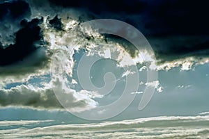 In the summer sky black clouds of the approaching storm