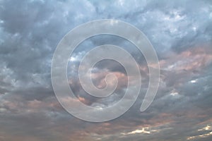 Sky and mysterious cloud with orange and blue color of sunset after storm