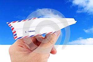 Sky and paper airplane email concept