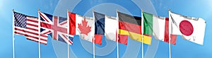 Sky physical version and silk waving flags of G7 countries. Germany, Canada, USA, Italy, France, Japan photo