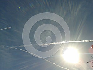 Sky polluted with chemtrails photo