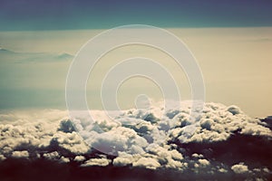 Sky with puffy clouds in vintage, retro style