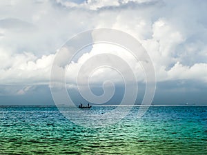 Sky and rainbow sea