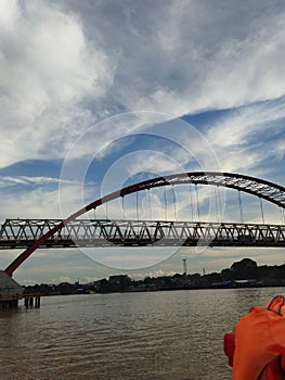 Sky, river and bridge in afternoon