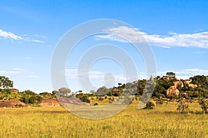 Sky and rocks on endless plain of Serengeti. Tanzania, Africa