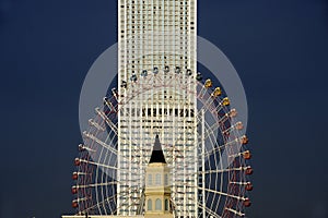 Sky scraper and ferris wheel