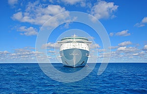 Sky and sea isolated cruise ship