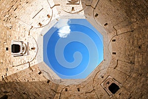 The sky seen from the courtyard of Castel del Monte. Apulia, Italy