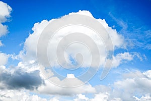 The sky in the snow-white clouds bizarre