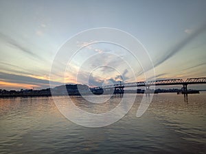 The sky when the sun will rise in the river