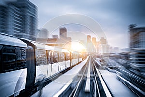 Sky train through the city center in Kuala Lumpur,motion blur