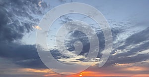 Sky wide panorama with sunset and clouds. Horizontal cloudscape nature background