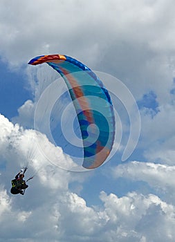 A skydiver coming in for landing