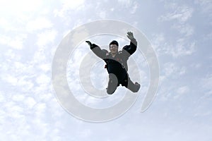 Skydiver falls towards the cameraman