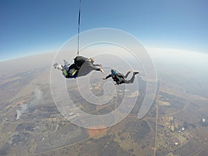 Skydiver films tandem skydive photo