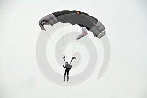 Skydiver with open parachute